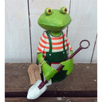 Zaunhocker Frosch mit Schaufel