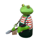 Zaunhocker Frosch mit Schaufel
