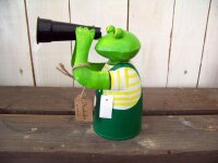Frosch Zaunhocker mit Fernrohr