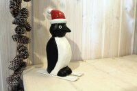 Pinguin auf Ski